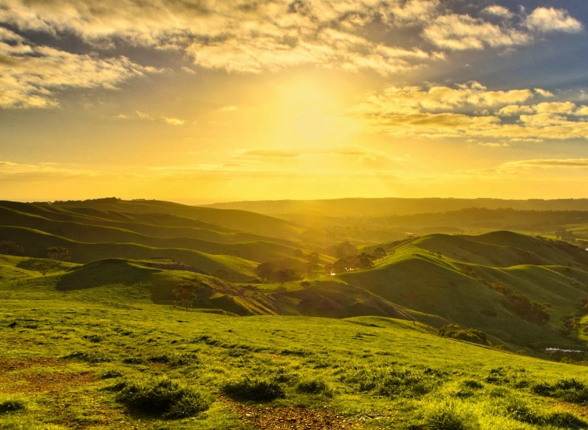 Beautiful sunrise over rolling hills in Yankalilla, South Australia, capturing nature's tranquility
