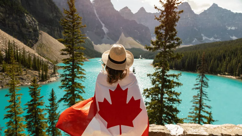 Canada flag on the back of a woman