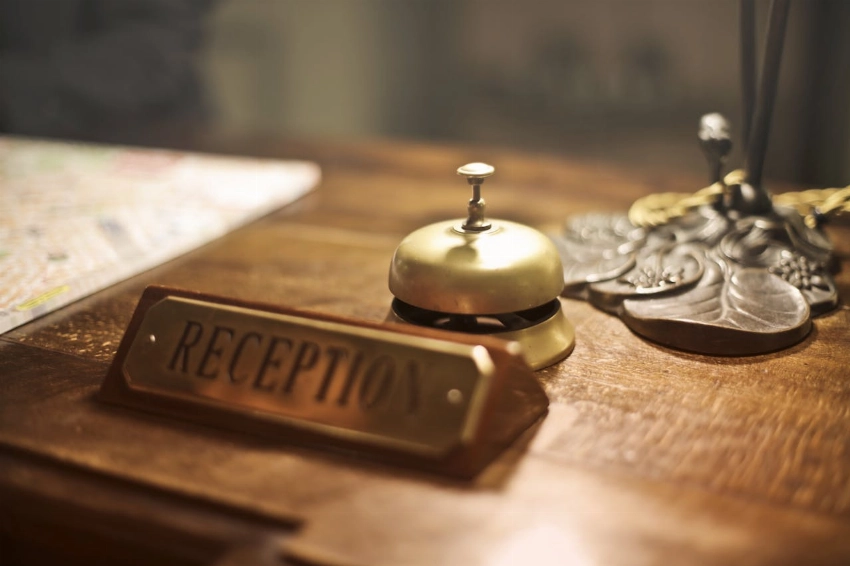 Reception table and bell; Hospitality Management Courses in Australia