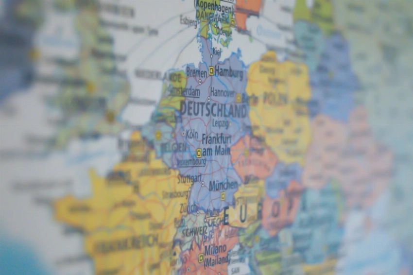 Close-up view of Germany on a colorful world map showing major cities