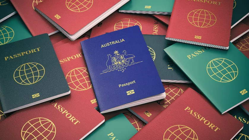Many passports lying on a surface