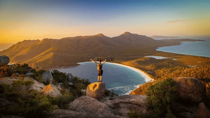 Tasmania natural landscape with a man enjoying the view